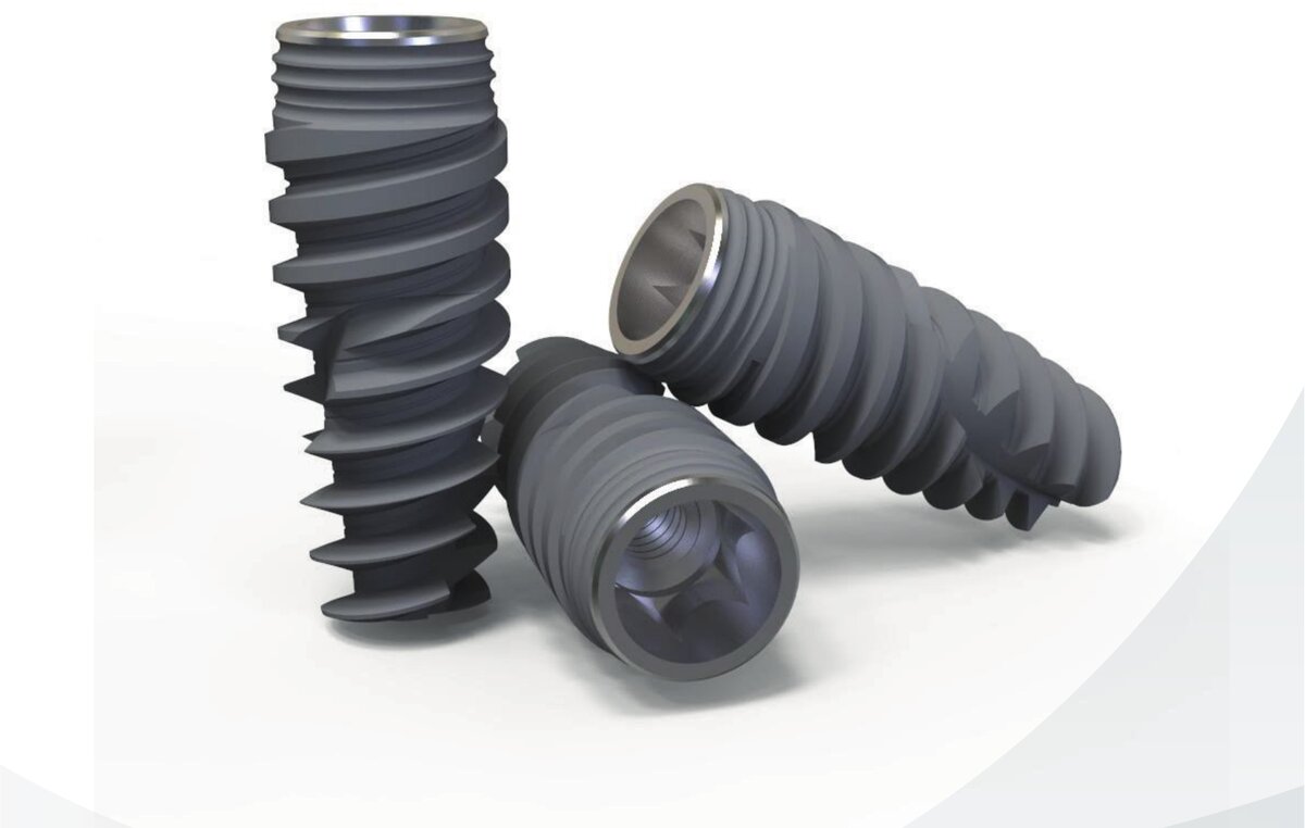 Three implants showing thread geometry and internal connection